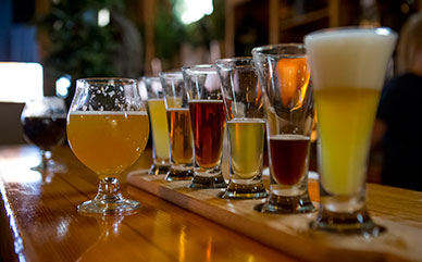 Beer glasses resting on the Altitude Chophouse and Brewery bar.