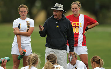 Coach Jim Gardner talking to the LCCC Women's Soccer Team