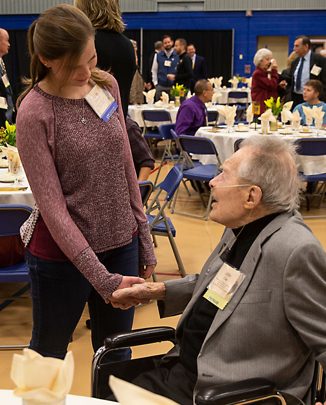 LCCC student Sarah Graham chats with LCCC Foundation Board Member John Clay during the 2019 Scholarship Luncheon.
