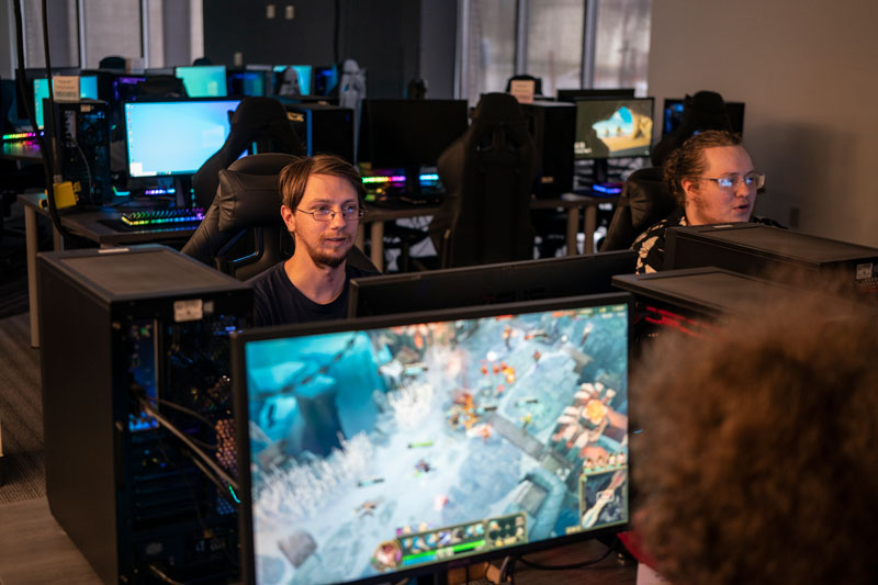 Students at the computers in the new Esports computer lab on campus