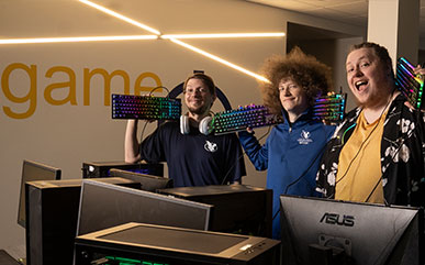 Skylar Wolfe, computer science major; Nathaniel Roof, fine arts major with emphasis in theater; and Eyon Palmer, fine arts major with emphasis in theater showcase the arena where they play LCCC’s newest sport, Esports.