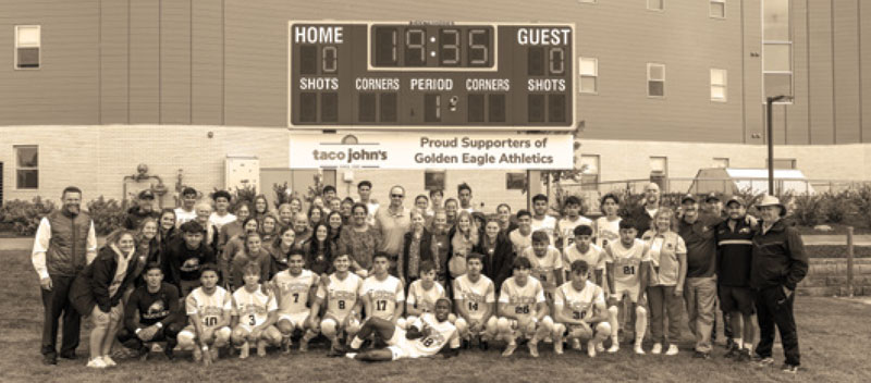 LCCC Athletics staff, coaches and President Joe Schaffer joined staff from Taco Johns to dedicate the new Taco Johns scoreboard.