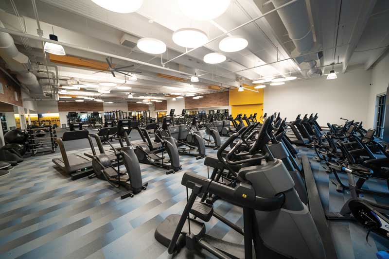 View in the workout area in the newly renovated RAC with elliptical machines and treadmills