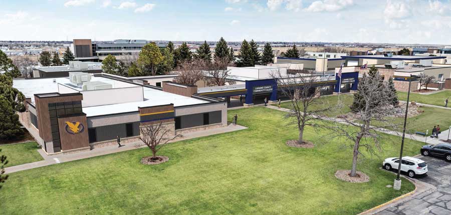 Mock up of the CCI building, Administration building and Training Center after the exterior renewal project with wood/metal/stone finishes and more signage and highlighted entryways