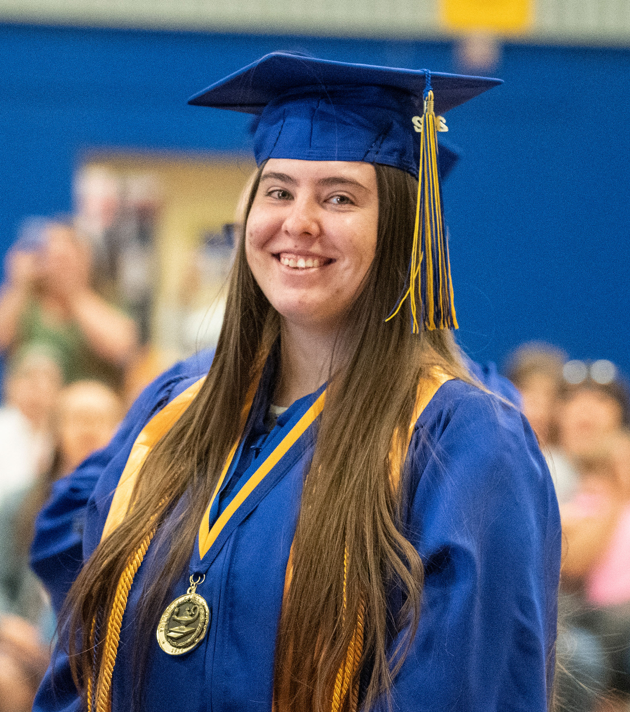 photo of Dariia Kasymova in graduation cap and gown