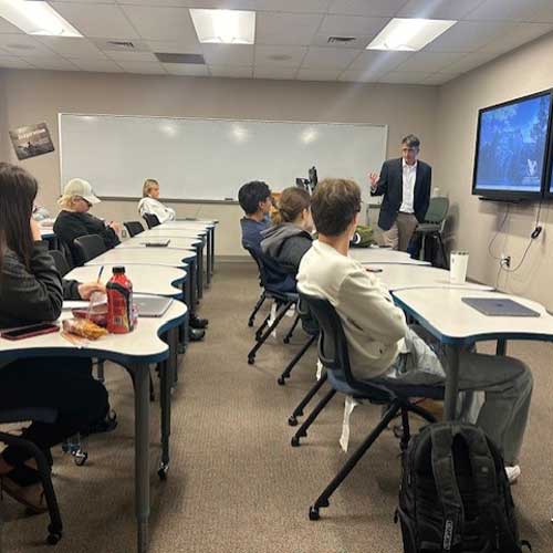 Ryan Holston speaking in a classroom