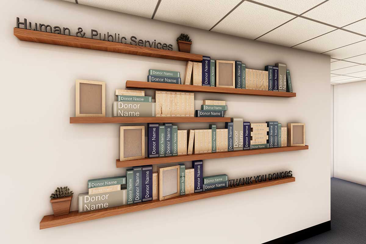 A 3D rendering at an angle of the human and public services pathway donor wall with fake books on shelves with donor names on them and plants and the title.