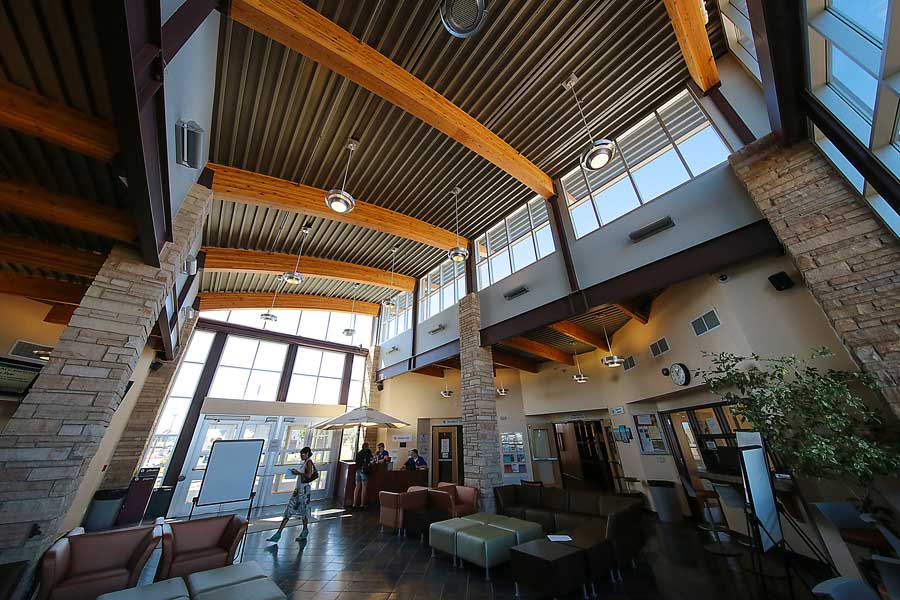 inside the Albany County Campus building with students and staff