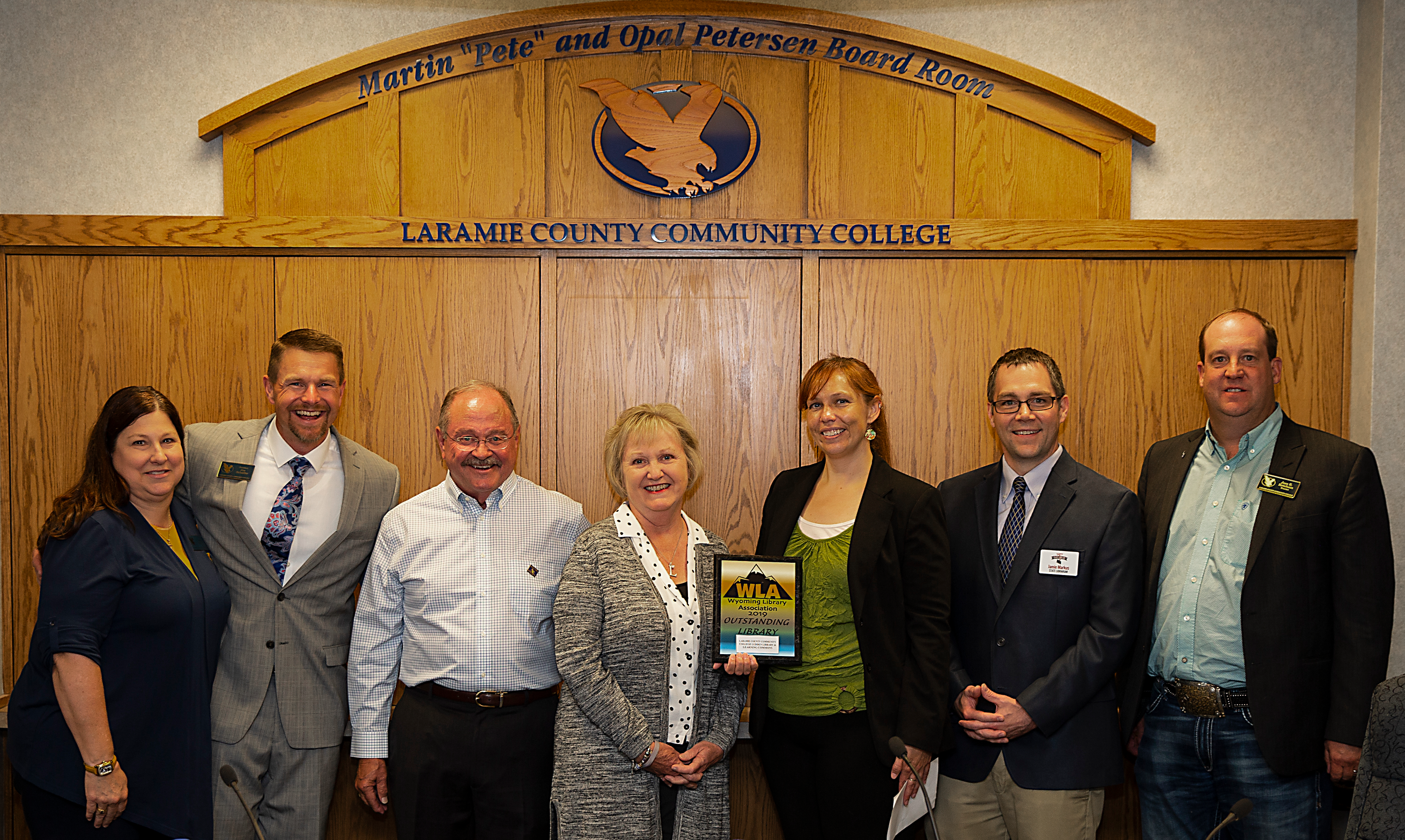 The award was presented at the LCCC Board of Trustees’ meeting on Wednesday, Aug. 21. From left: Linda Herget of the LCCC Ludden Library; Dr. Joe Schaffer, President of LCCC; Randy Ludden; Yvonne Ludden; Abby Beaver, President of WLA; Jamie Markus, Wyoming State Librarian; and Jess Ketcham, Chairman of the LCCC Board of Trustees.
