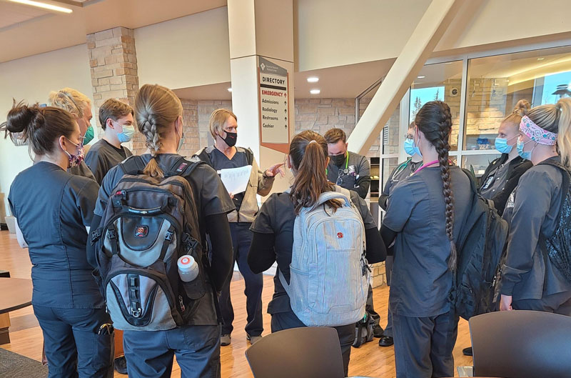 Students in LCCC’s nursing program, receive direction from CRMC staff to assist with a recent surge of patients at the hospital.