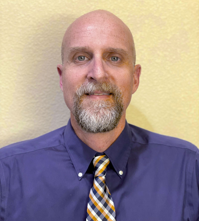 Photo of the new athletic director Mark Puev.