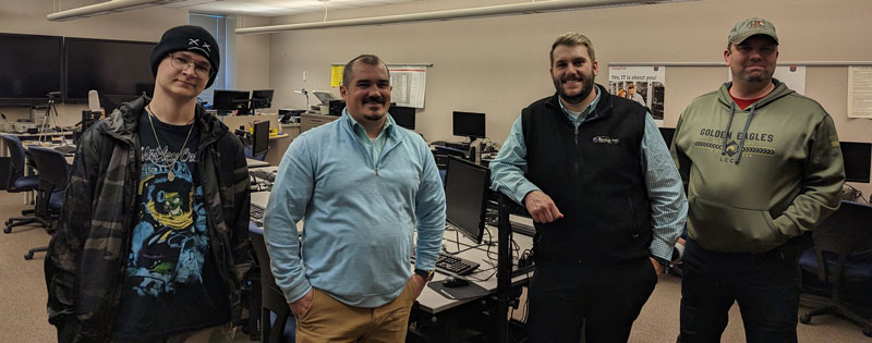 photo of four students who competed in the Cybersecurity Tournament