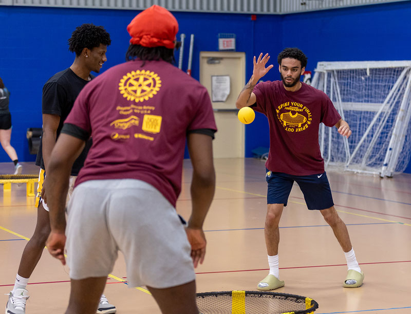 Photo of college students playing spikeball at LCCC