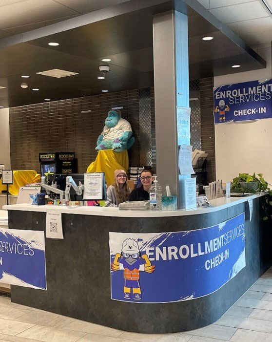 Photo of the temporary check-in desk in the Clay Pathfinder Building where Coffee 101 was located.