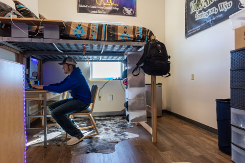 Student studies in residence hall