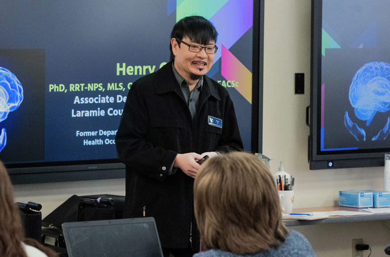 Dr. Henry Oh teaches students.