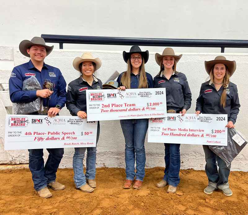 Winners from the LCCC Ranch Horse Team holding their checks with their winnings.