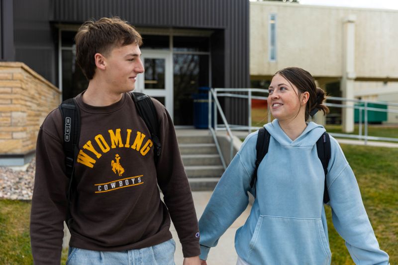 LCCC students Larry and Carlee walk outside of the Business Building.