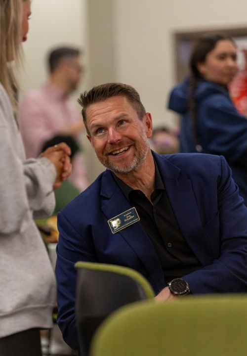 LCCC President Joe Schaffer speaks with a student.