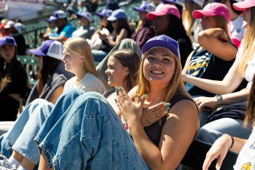 An LCCC student enjoys the game after the Business of Baseball event.