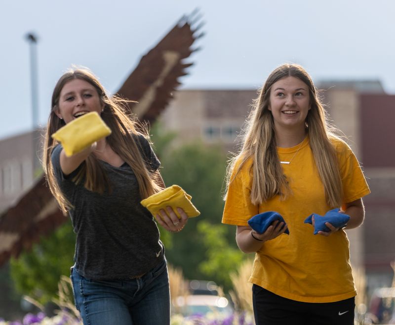 LCCC students play cornhole during a student event.