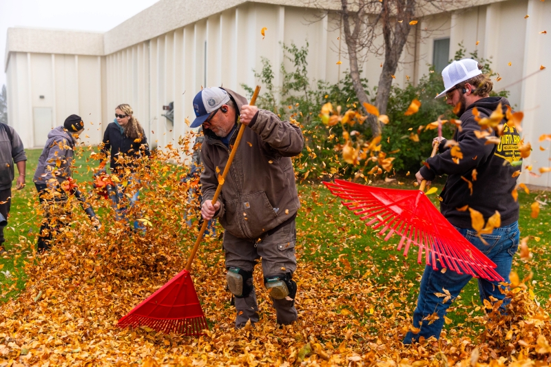The LCCC grounds crew rakes leaves on the Cheyenne campus