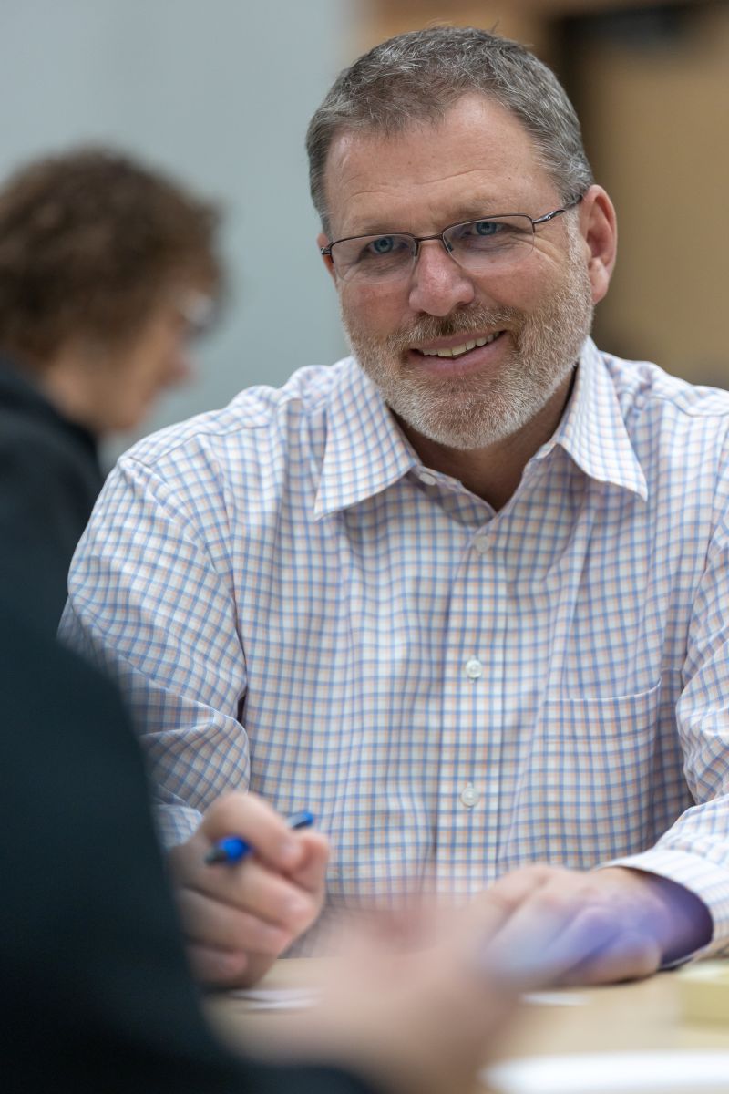 LCCC Business & Finance Program Director Jeff Shmidl works with students during Fall Kickoff. 
