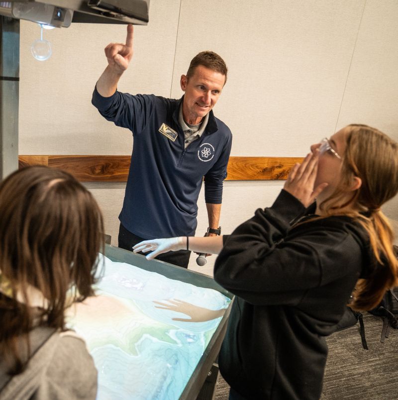 LCCC STEM Pathway Coordinator Trent Morrell gives a presentation to K-12 students. 