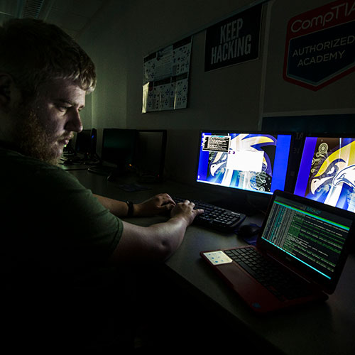 student working on computer