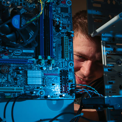 student looking through computers