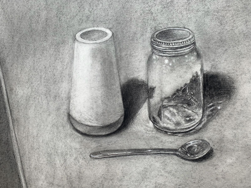 LCCC Student black and white drawing of two containers and a spoon on a table