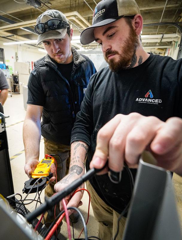 photo of HVAC apprenticeship looking a wires